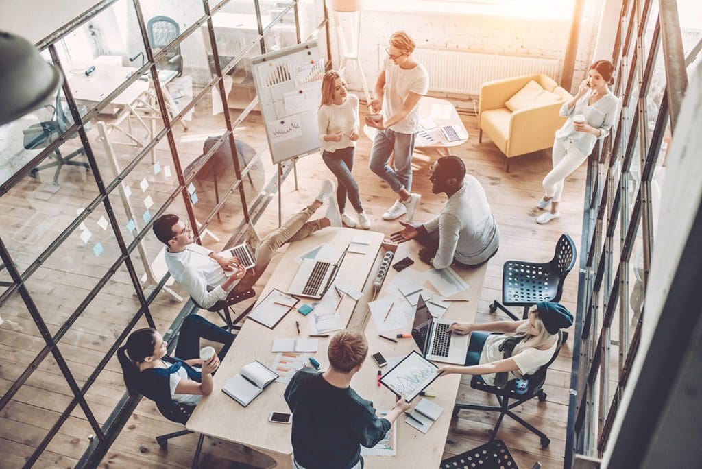 Team Meeting around desk